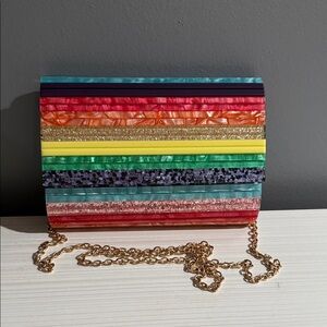 Kurt Geiger London Party Envelope Clutch in multi-colored striped acrylic design